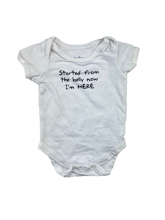 Indigo White Onesie with "Started From The Belly Now I'm HERE" 3-6M